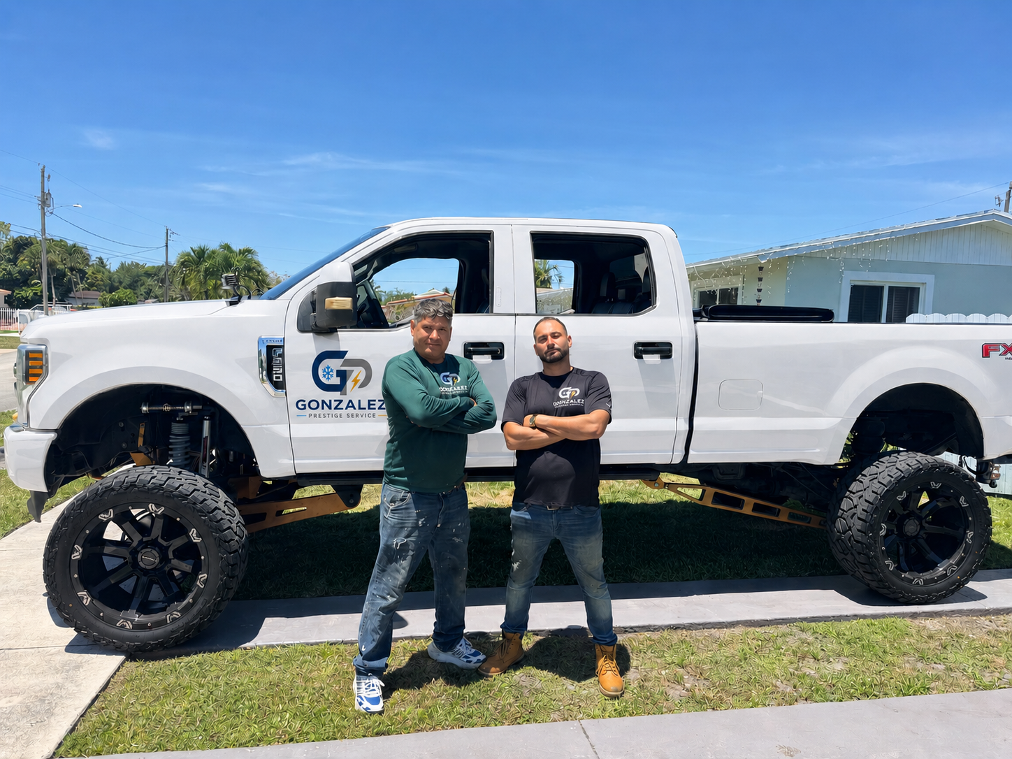 Gonzalez Prestige Service team with branded truck